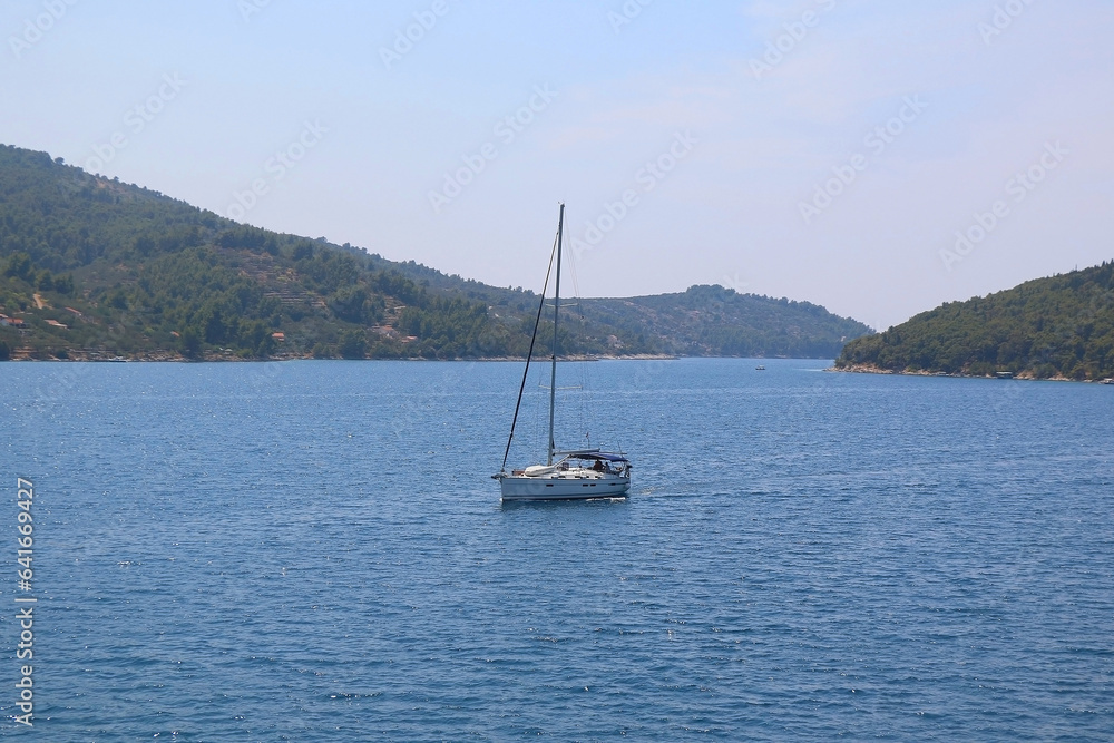 Sailing boat and beautiful Adriatic sea landscape in Croatia. Sailing boat and beautiful Adriatic sea landscape in Croatia.