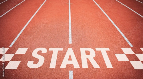 Start point on Running track. Concept of business competition, planning for business startup, strategies, and challenges or career paths with opportunities and changes.