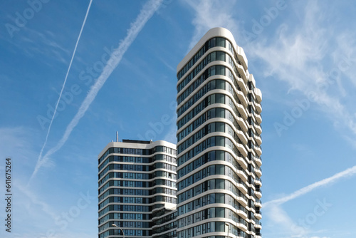 Bild auf Leinwand Modern corporate buildings against the blue sky