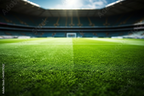 A close-up of a football field with fans in the stands background with empty space for text 