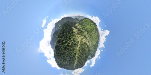 Fototapeta Naklejka Na Ścianę i Meble -  Tiny Planet Panorama of a Lush Green Landscape