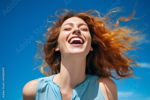 Lifestyle portrait photography of a grinning girl in her 30s laughing against a sky-blue background. With generative AI technology