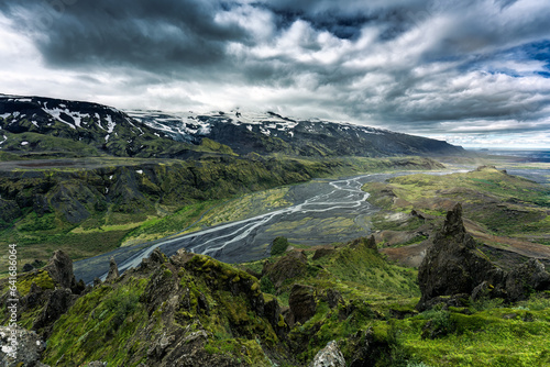 Volcanic landscape of Valahnukur trail in Thorsmork valley and moody sky in summer at Iceland photo