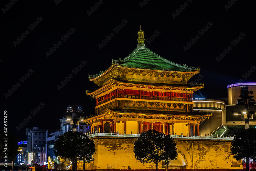 Night scene of illuminated Bell Tower of Xi'an (1384) -is a symbol of the city of Xi'an and one of the grandest of its kind in China. XI’AN, CHINA. Night scene of illuminated Bell Tower of Xi'an (1384) -is a symbol of the city of Xi'an and one of the grandest of its kind in China. XI’AN, CHINA.
