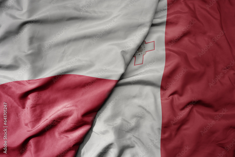 big waving national colorful flag of poland and national flag of malta . big waving national colorful flag of poland and national flag of malta .