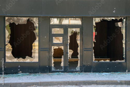 Broken glass of a store in the city