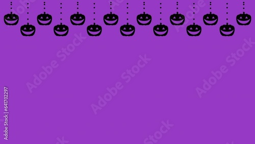 ハロウィン　吊り下げパンプキン　黒　背景　紫