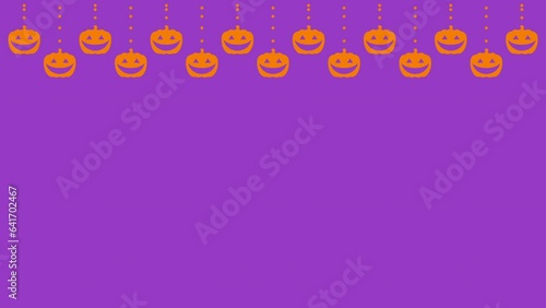 ハロウィン　吊り下げパンプキン　オレンジ　背景　紫　