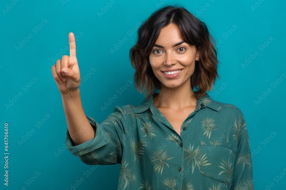 Medium shot portrait photography of a satisfied girl in her 30s pointing at oneself with the index finger against a tropical teal background. With generative AI technology Medium shot portrait photography of a satisfied girl in her 30s pointing at oneself with the index finger against a tropical teal background. With generative AI technology