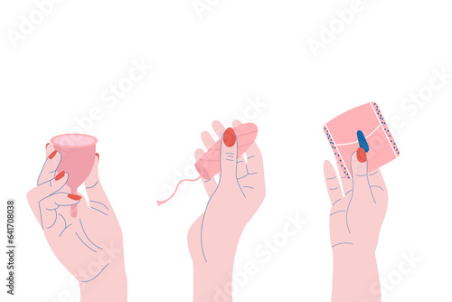 A hand holds a tampon, a pad, a menstrual cup