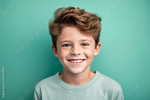 Close-up portrait photography of a glad kid male smiling against a spearmint green background. With generative AI technology