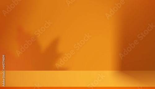 Studio background display with maples shadow leaves on orange cement wall room,Transparent soft light for branches leaf,Concept for Cosmetic product presentation,Sale,Online shop in Autumn,Fall Season