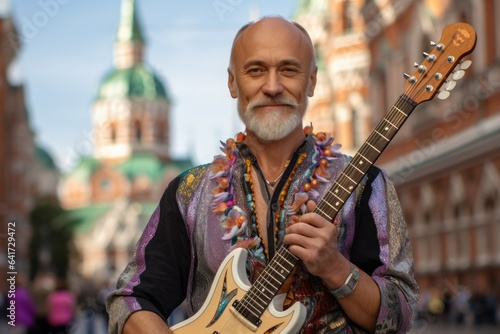 Medium shot portrait photography of a blissful mature man holding a guitar donning a bold statement necklace at the red square in moscow russia. With generative AI technology