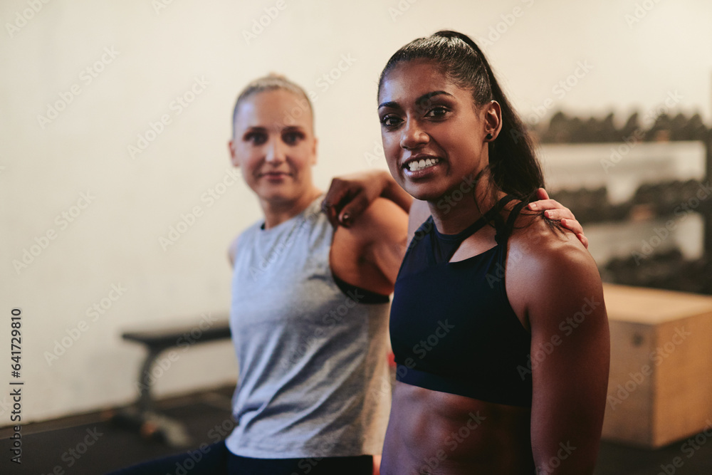 Two fit young woman smiling together after a workout Two fit young woman smiling together after a workout