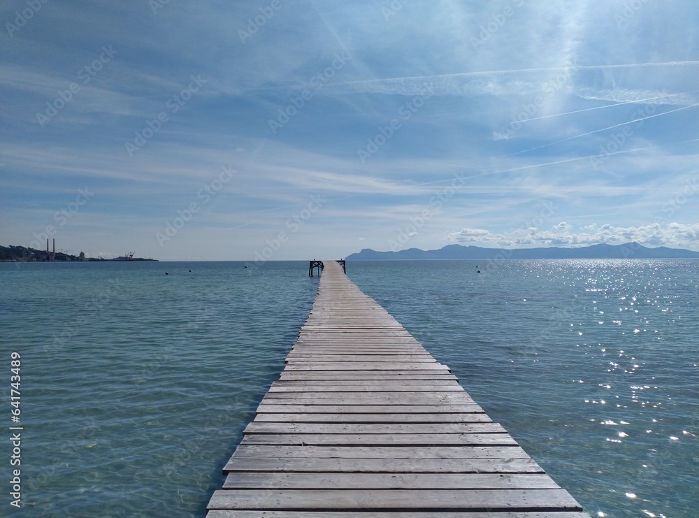 Obraz premium Amazing scene of pier in the sea in Alcudia Majorca Beach