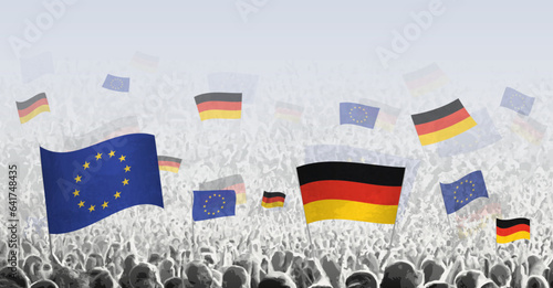 Crowd with flag of European Union and Germany, people of Germany with flag of EU.