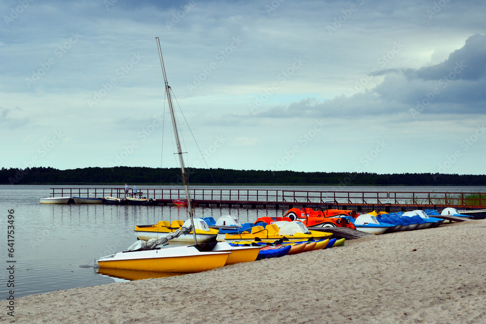Sarbsko lake, a coastal lake on the Slowinski Coast, Poland. Water equipment rental - boats, kayaks, pedal boats