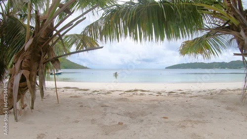 Anse Madge beach on a cloudy day. Praslin island, Seychelles photo