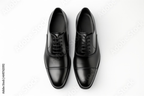 Beautiful black men's classic shoes or suit shoes isolated on white background, top view.generative ai 