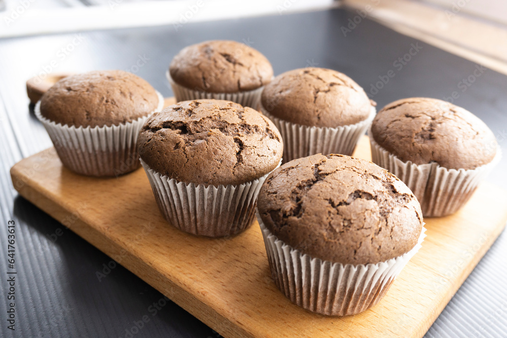 chocolate muffins on a dark background. food concept. dessert. bakery. diet chocolate muffins on a dark background. food concept. dessert. bakery. diet