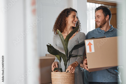 Photos Moving, new home or happy couple with boxes in real estate, property or rental apartment