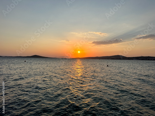 Cunda Island view  Ayvalik. Golden hour  sunset above Aegean Sea in Ayvalik  Balikesir Province  Turkey. 