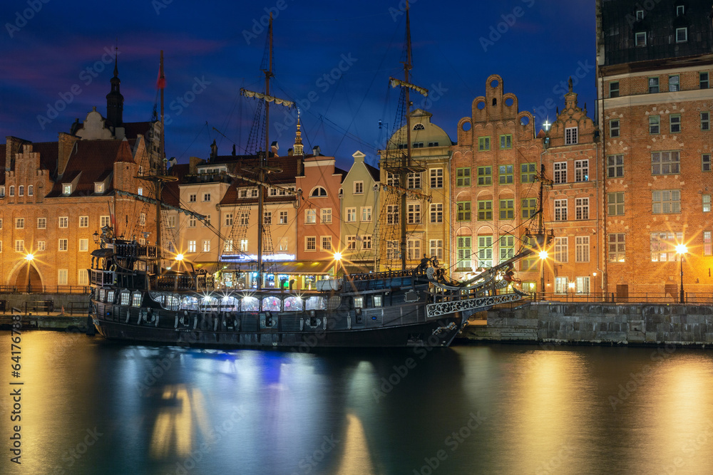 Old Town of Gdansk, Dlugie Pobrzeze and Motlawa River in night, Poland