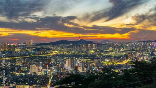 Seoul city skyline and Seoul tower modern building and architecture,  the Seoul tower  in downtown Seoul, South Korea.4k timelapse