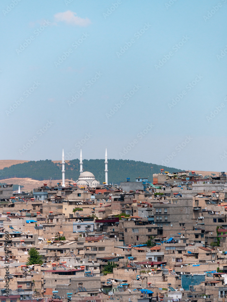 Hills and their dense cityscane surrounding of Gaziantep, Turkey seen from the Old Town  - Portrait shot 1