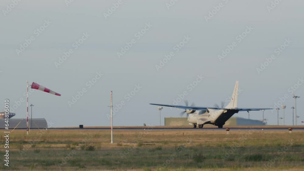 Slow-motion of a military plane take off on the runway in airport. Take off of the military plane Slow-motion of a military plane take off on the runway in airport. Take off of the military plane