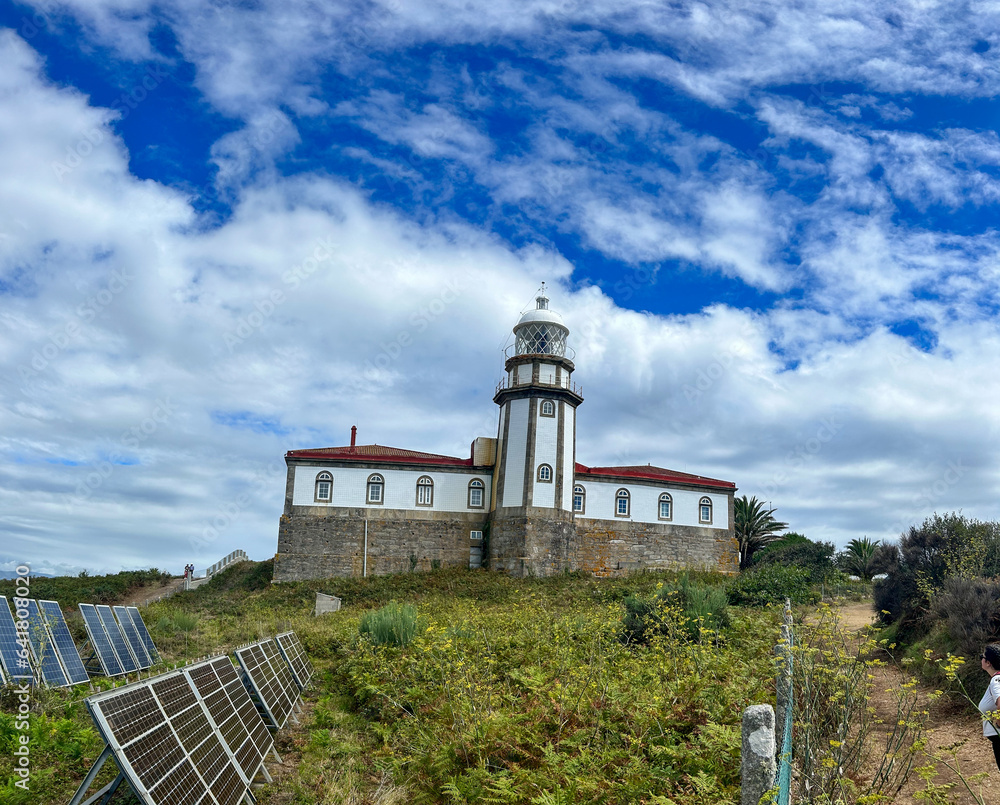 Guiding Light: Ons Island's Majestic Lighthouse Shining on a Clear Day