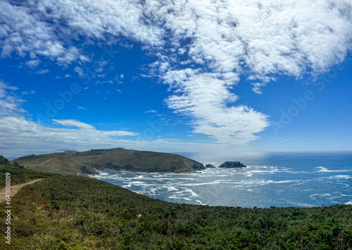 Cliffs of Ons Island: Nature's Fierce Encounter with the Sea on a Clear Day