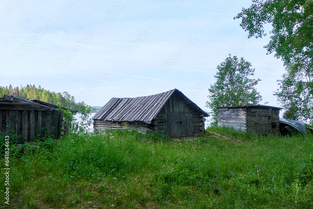Fishing shack on the shore of the White Sea. White Sea, Kola Peninsula. Fishing shack on the shore of the White Sea. White Sea, Kola Peninsula.