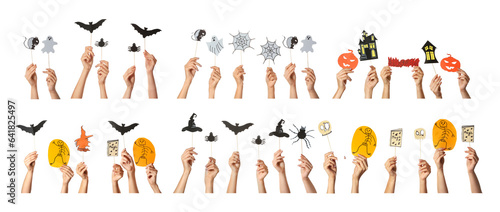 Collage of many hands with Halloween decor on white background