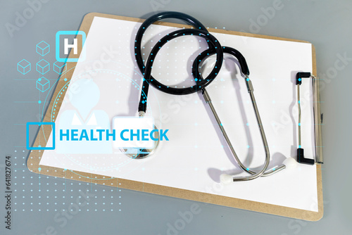 medical stethoscope on gray table writing paper,clinical medical treatment,health check,Medicine and Research