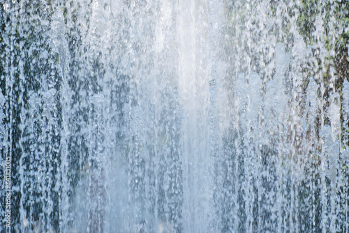 Background of fountain water jets closeup. © freeman83