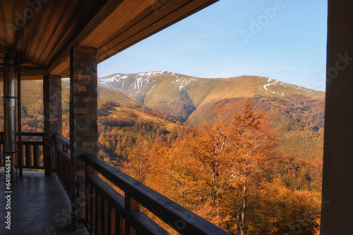 Golden Autumn Serenade: Majestic Carpathian Peaks Embraced by Nature's Palette