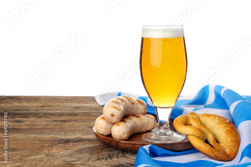 Glass with cold beer, sausa...