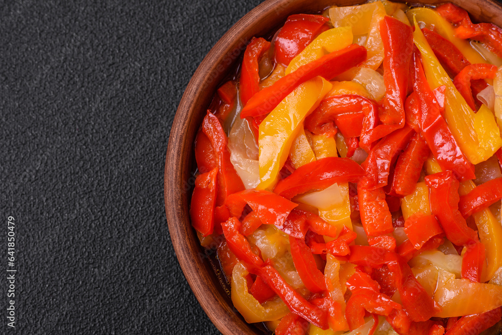 Delicious fresh saute sweet bell pepper slices with onion, salt, spices and herbs Delicious fresh saute sweet bell pepper slices with onion, salt, spices and herbs
