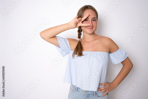 Portrait of cute sweet gorgeous she give v-sign near eye make hollywood white smile stand isolated on white background