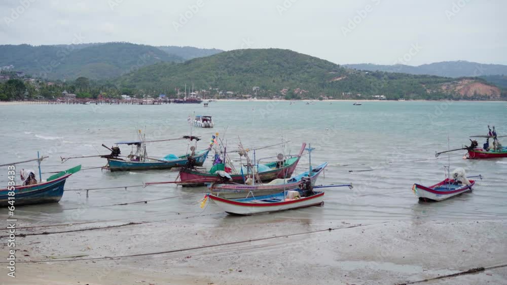 fishing boats on the island of koh samui, thailand fishing boats on the island of koh samui, thailand