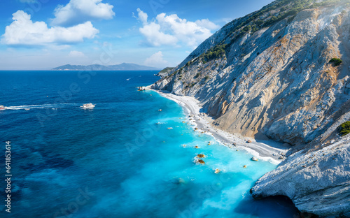 Panoramic aerial view of the north coast of Skiathos island with the popular Lalaria beach and fluorescent shining, blue sea, Sporades, Greece