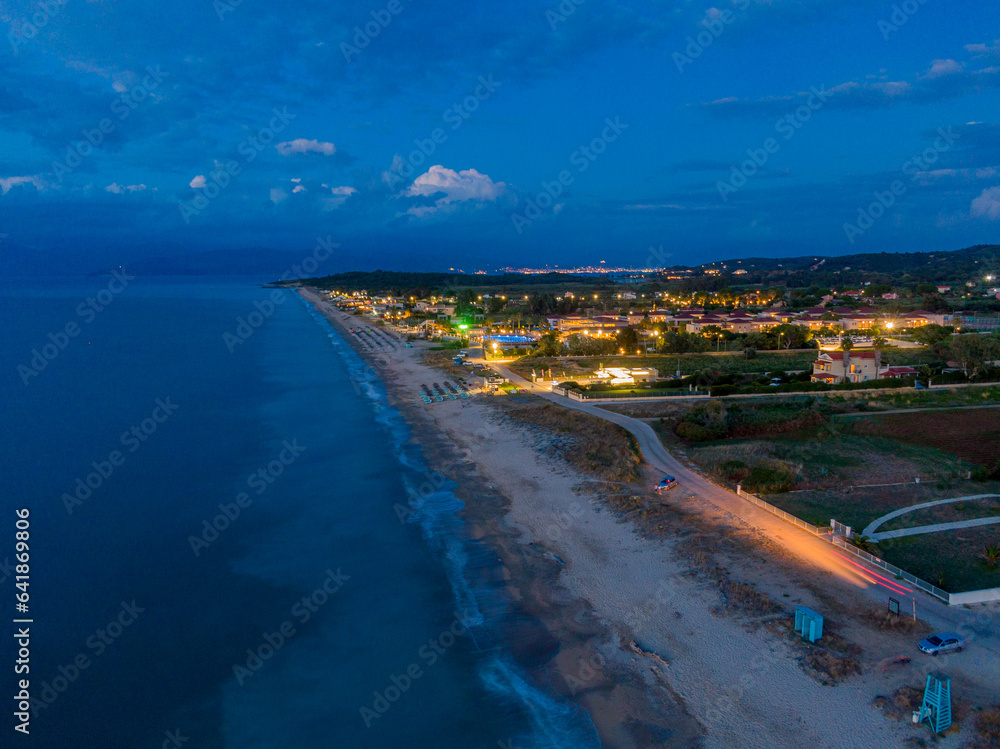 Aerial drone view of almyros beach by night  in north corfu,Greece