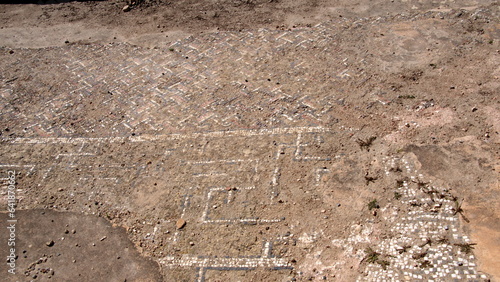 Tile mosaic floor in the Roman ruins at Oudna, outside of Tunis, Tunisia photo