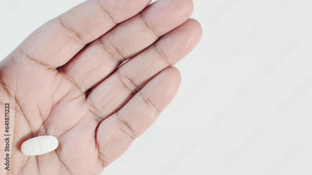 Breaking a Pill In the Hand Breaking a Pill In the Hand
