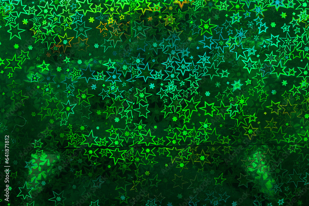 Holographic paper with a geometric pattern. Background or backdrop Holographic paper with a geometric pattern. Background or backdrop