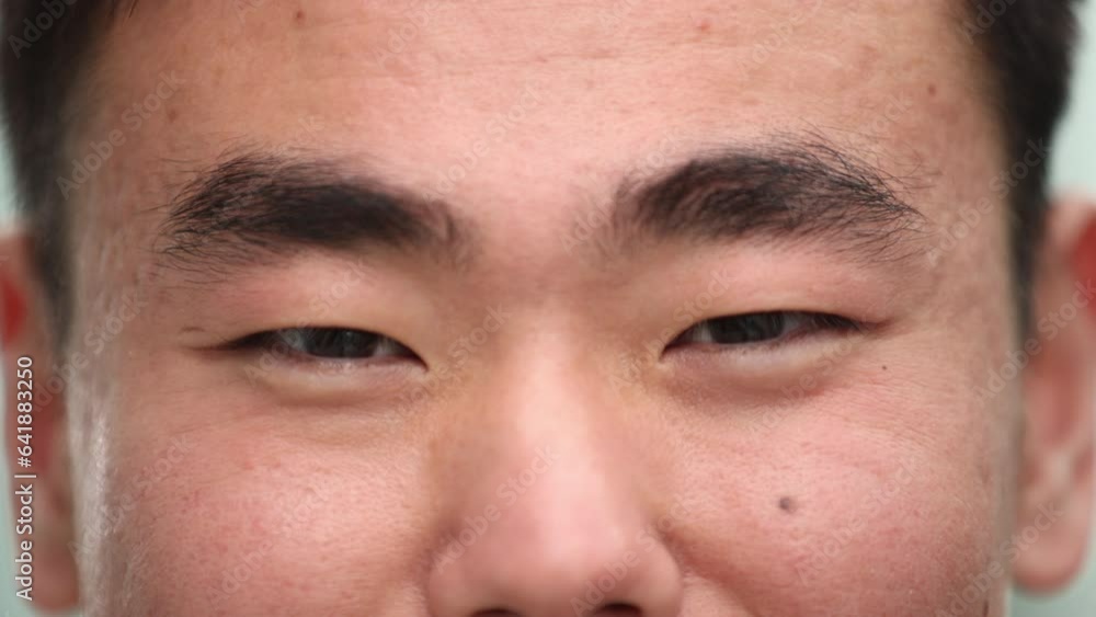 Human eyes extreme close-up. Macro shot of a man's brown eyes. Vision.