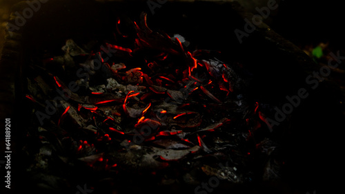 Quadro em tela burning coconut shell coals as background