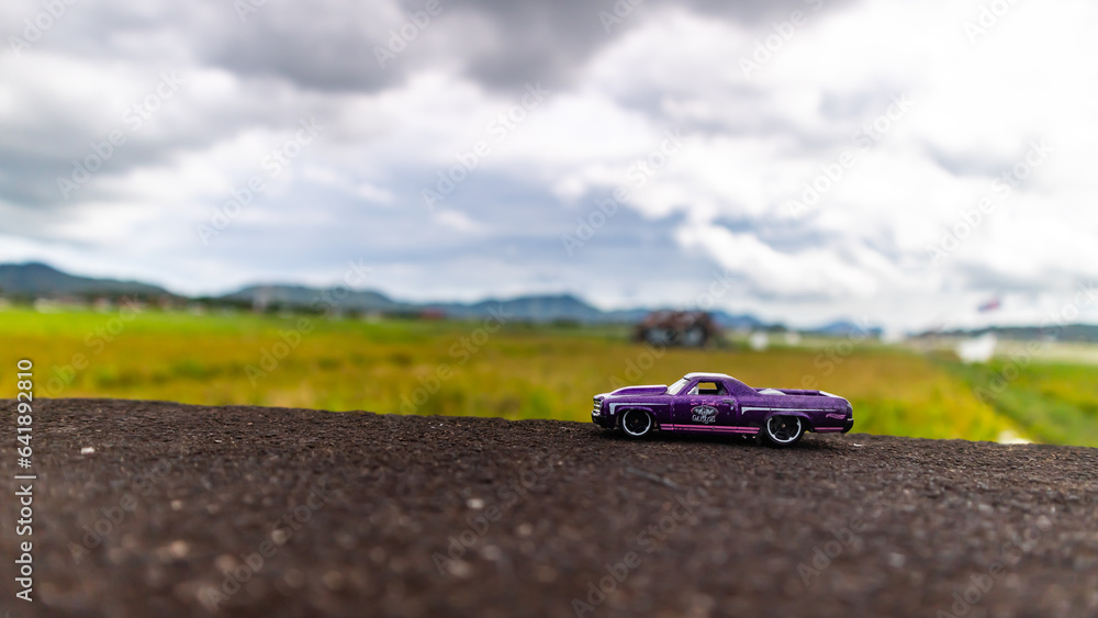 Fototapeta premium minahasa, Indonesia : January 2023, toy car in the rice field