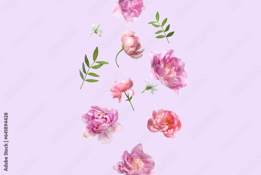 Beautiful pink flowers and green leaves falling on pastel violet background